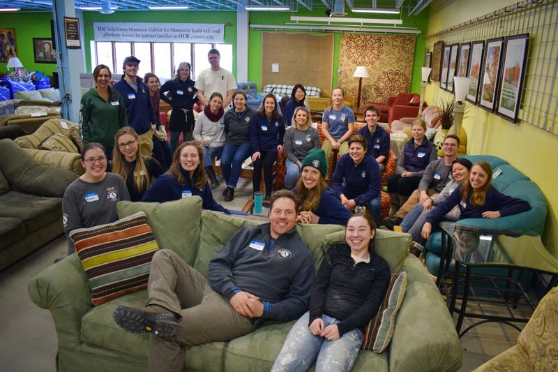 A group of AmeriCorps volunteers gathered for a photo at the Habitat ReStore in Williston