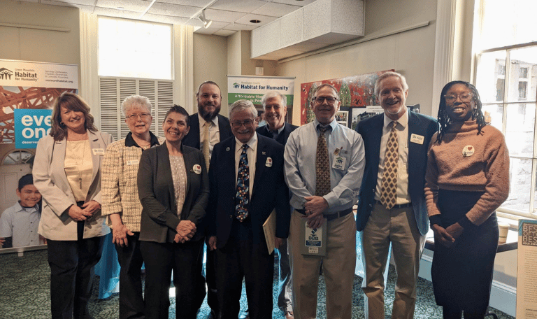 Habitat for Humanity affiliate leaders from across Vermont pose for a photo at Vermont's State House